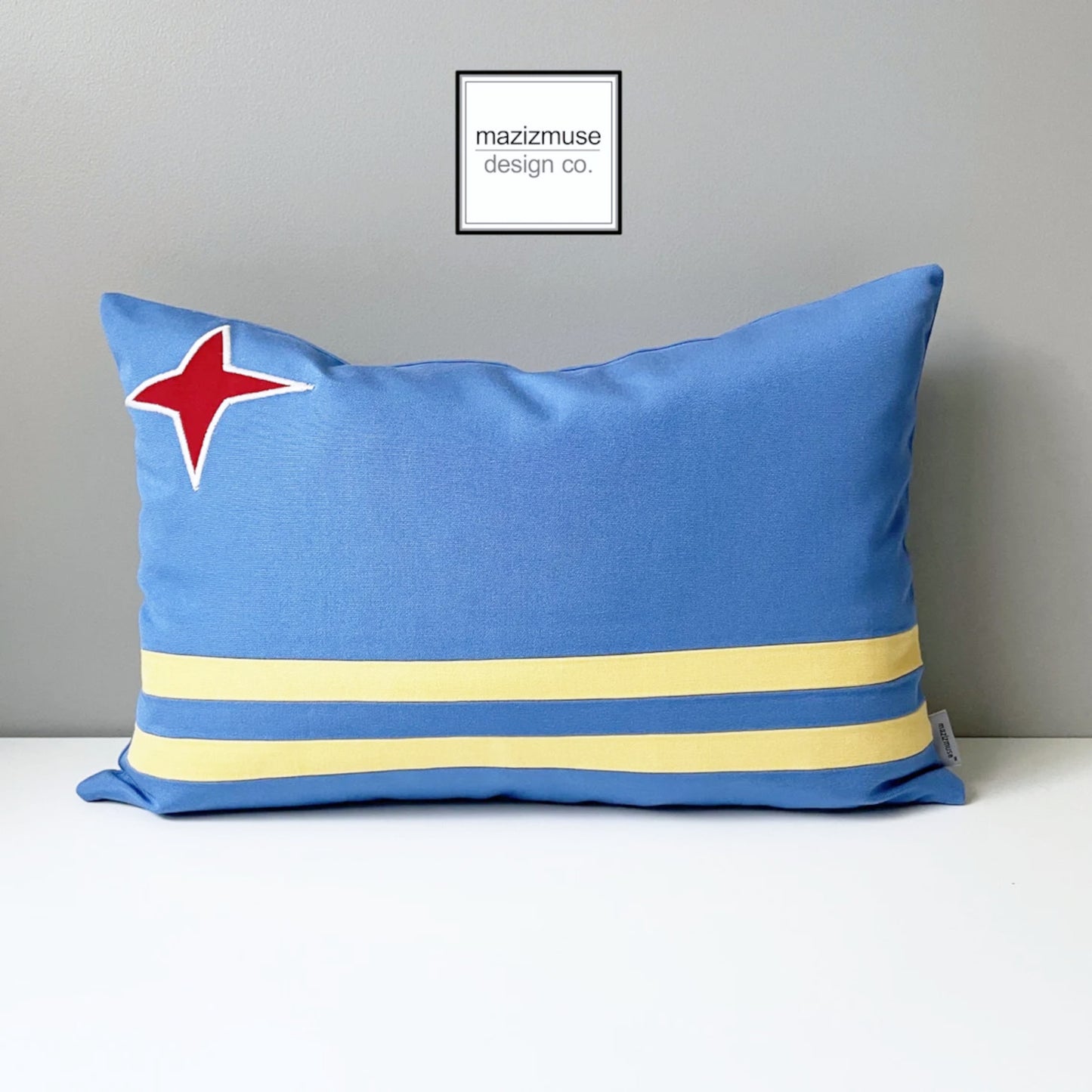 decorative aruba flag pillow in sunbrella outdoor fabric by mazizmuse