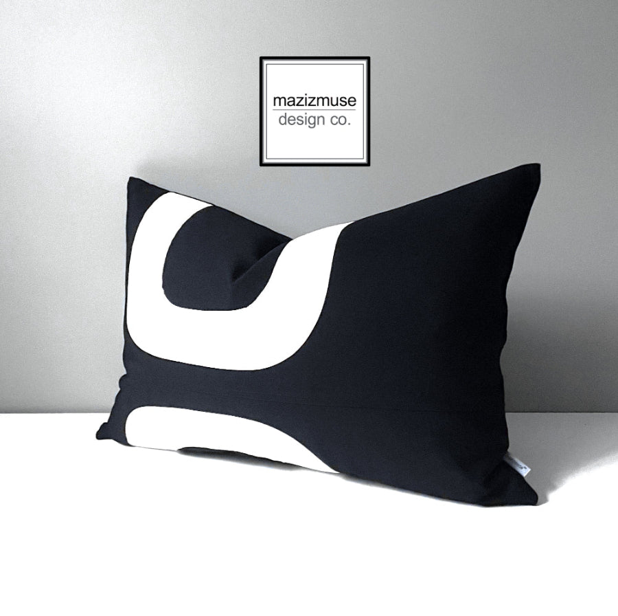 black and white mid century inspired outdoor pillow in sunbrella fabric for fade and stain resistance