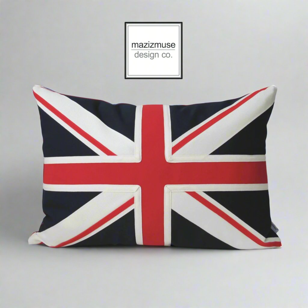 red cream and navy blue union jack flag crafted in sunbrella outdoor fabric for uperior fade and stain resistance. features the use of trim detail and meticulous applique wor.