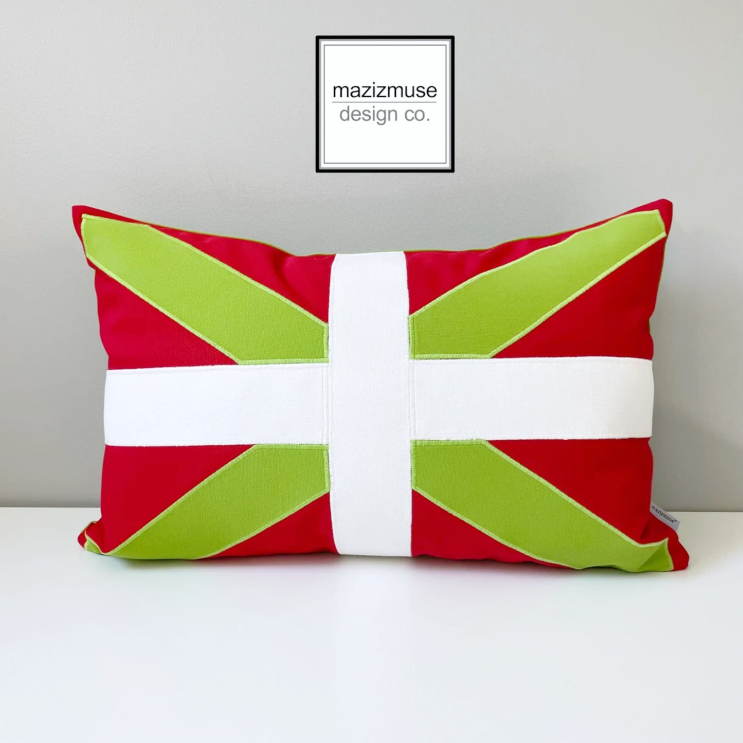 decorative basque country flag crafted in sunbrella outdoor fabric. red and lime green with the Ikurrina cross by mazizmuse