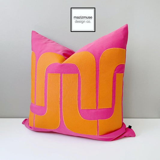 mid century modern outdoor pillow in hotpink and orange sunbrella fabric. decorative and unique pink cushions by mazizmuse