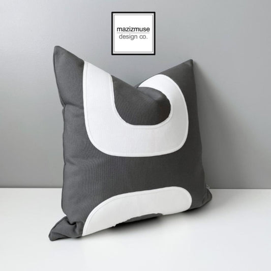 mid century modern outdoor pillow in grey with white retro design.