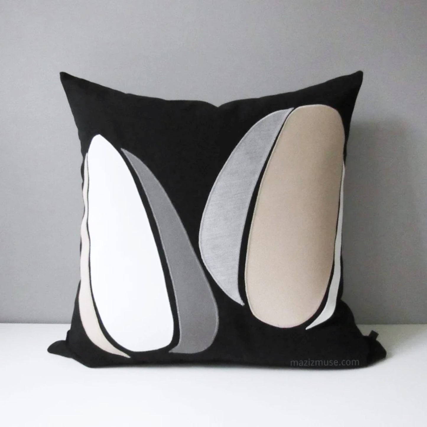 decorative black white and grey outdoor pillow with abstract circles design. modern sunbrella pillows handmade in canada by mazizmuse