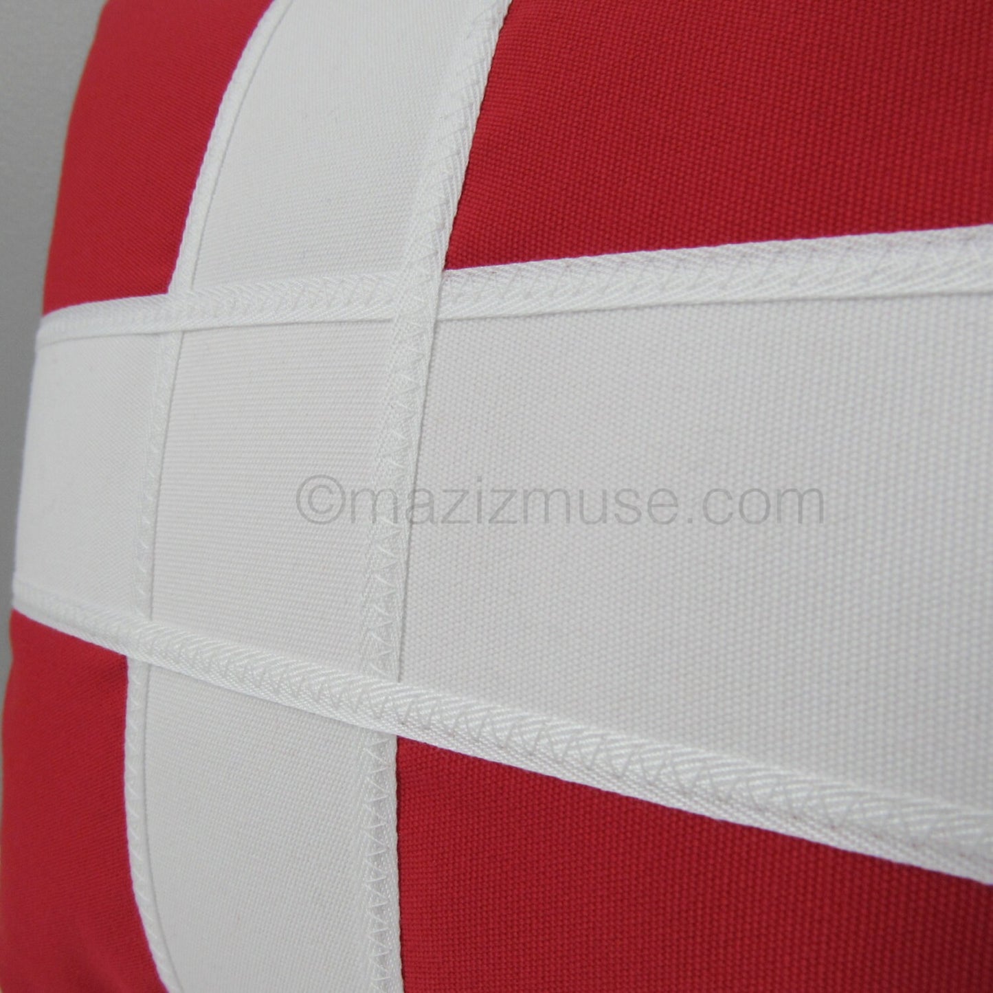 closeup of danish flag pillow applique details on sunbrella outdoor fabric