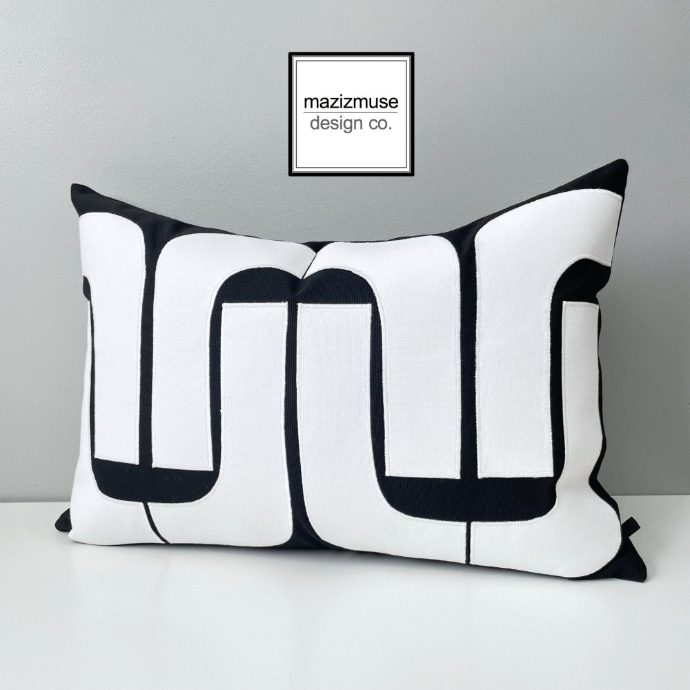 mid century modern outdoor pillow in black and white sunbrella fabric for patio and garden seating
