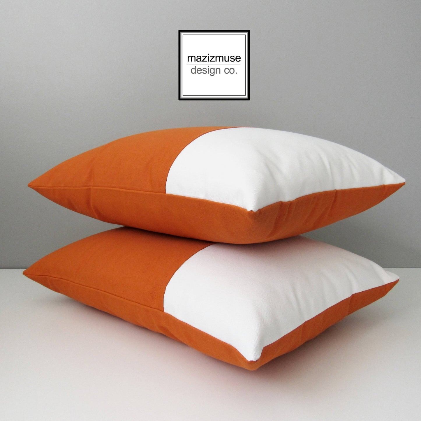orange and white colorblock sunbrella outdoor pillow