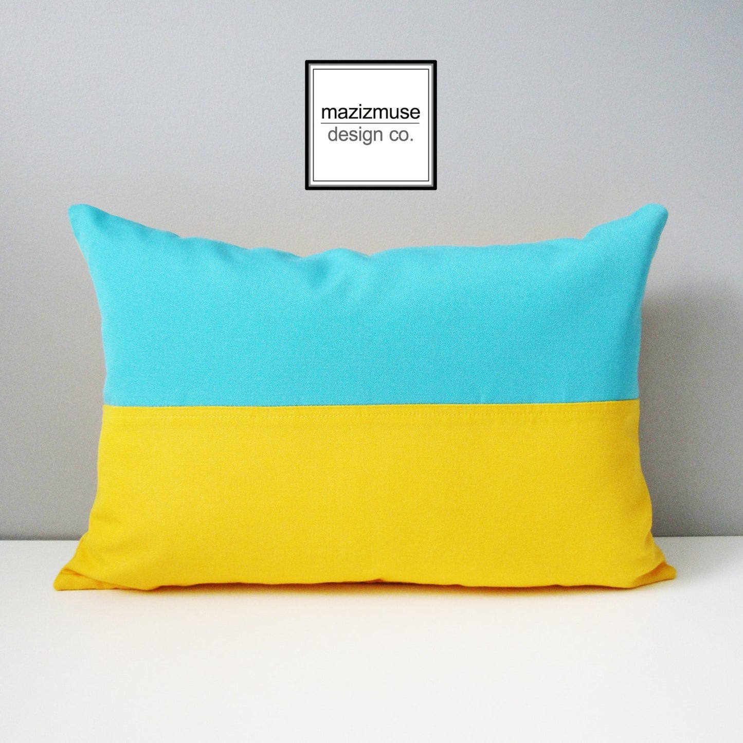 blue and yellow ukrainian flag pillow sewn in sunbrella outdoor fabric for superior fade and stain resistance.
