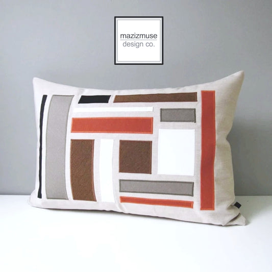 rust and teak sunbrella outdoor pillow in mondrian style squares