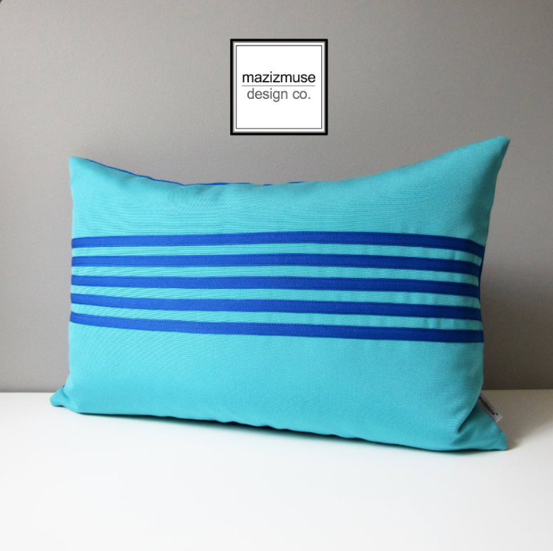 turquoise outdoor sunbrella pillow cover with cobalt blue stripe detail