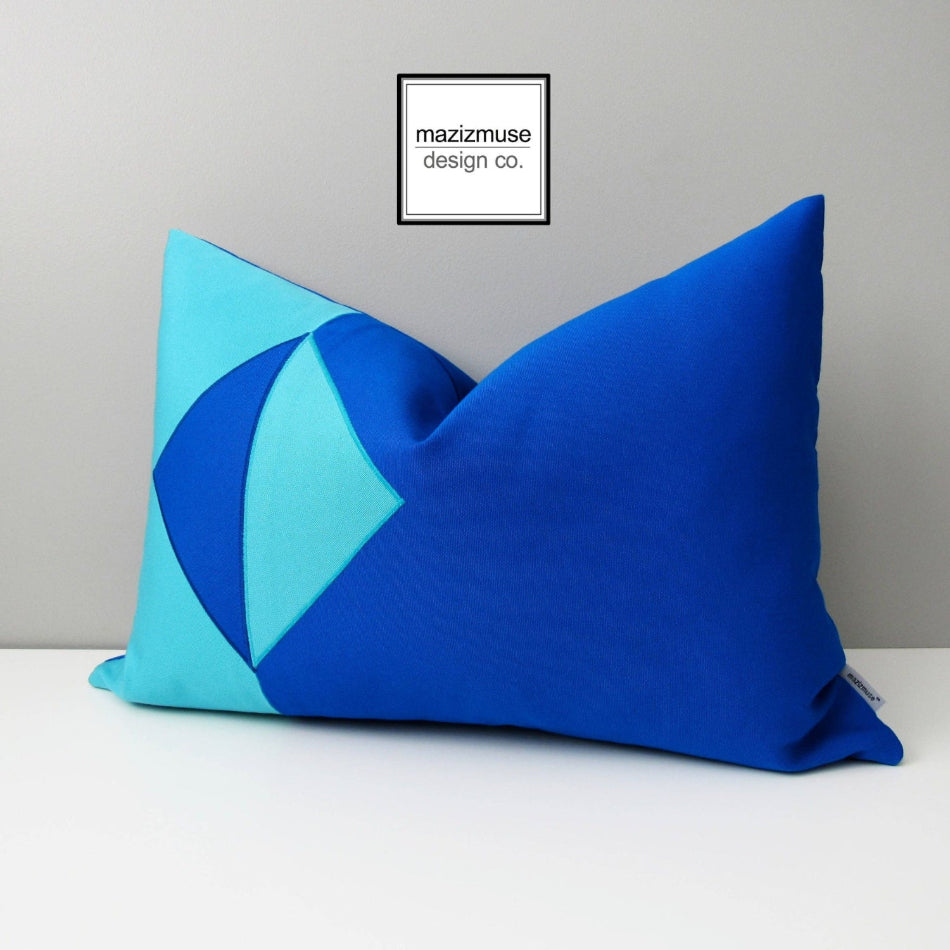 pacific blue sunbrella outdoor pillow in geometric design