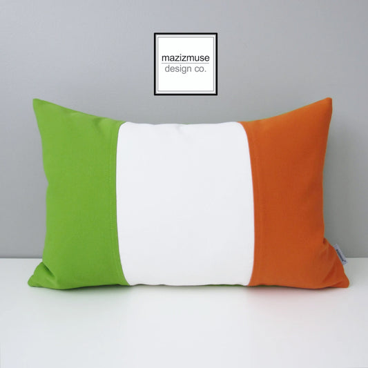 irish flag pillow in sunbrella outdoor fabric. lime green, white and orange are colorblocked and sewn to create the flag of ireland