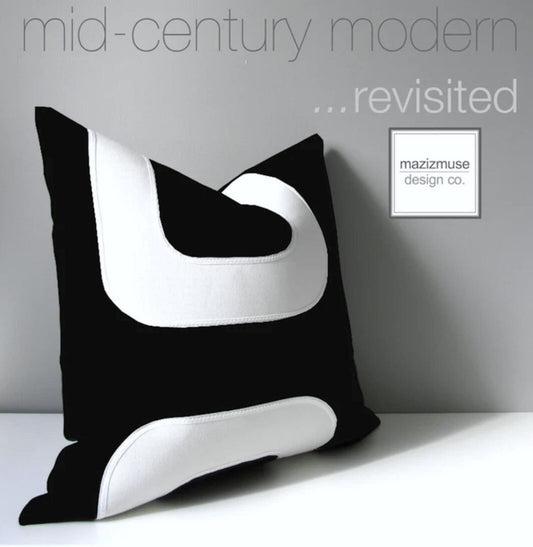 modern black and white mid century inspired outdoor pillow crafted in sunbrella performance fabric by mazizmuse