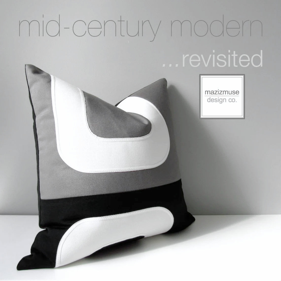 modern black and grey sunbrella outdoor pillow with white mid century design by mazizmuse