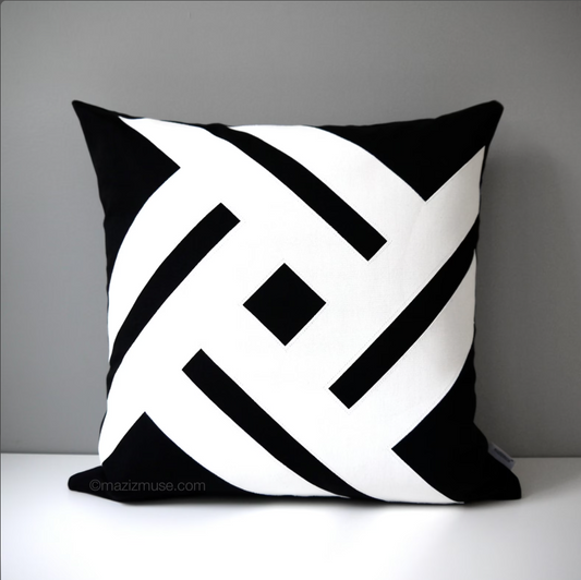 modern black and white outdoor pillow in striking pinwheel design. decorative sunbrella outdoor cushions by mazizmuse