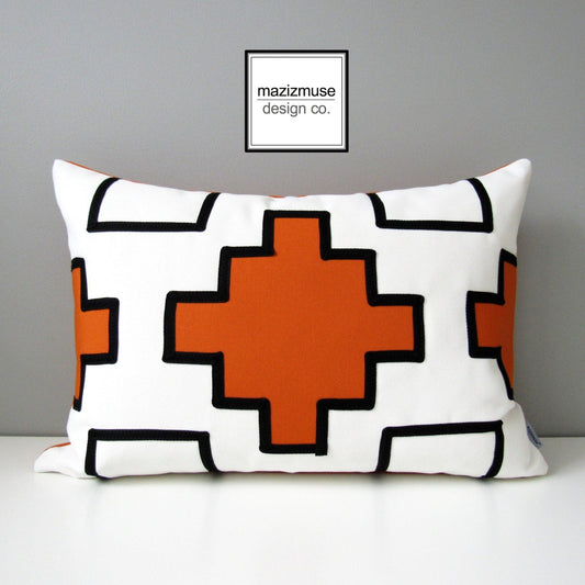 black white and orange outdoor sunbrella pillow in modern geometric design