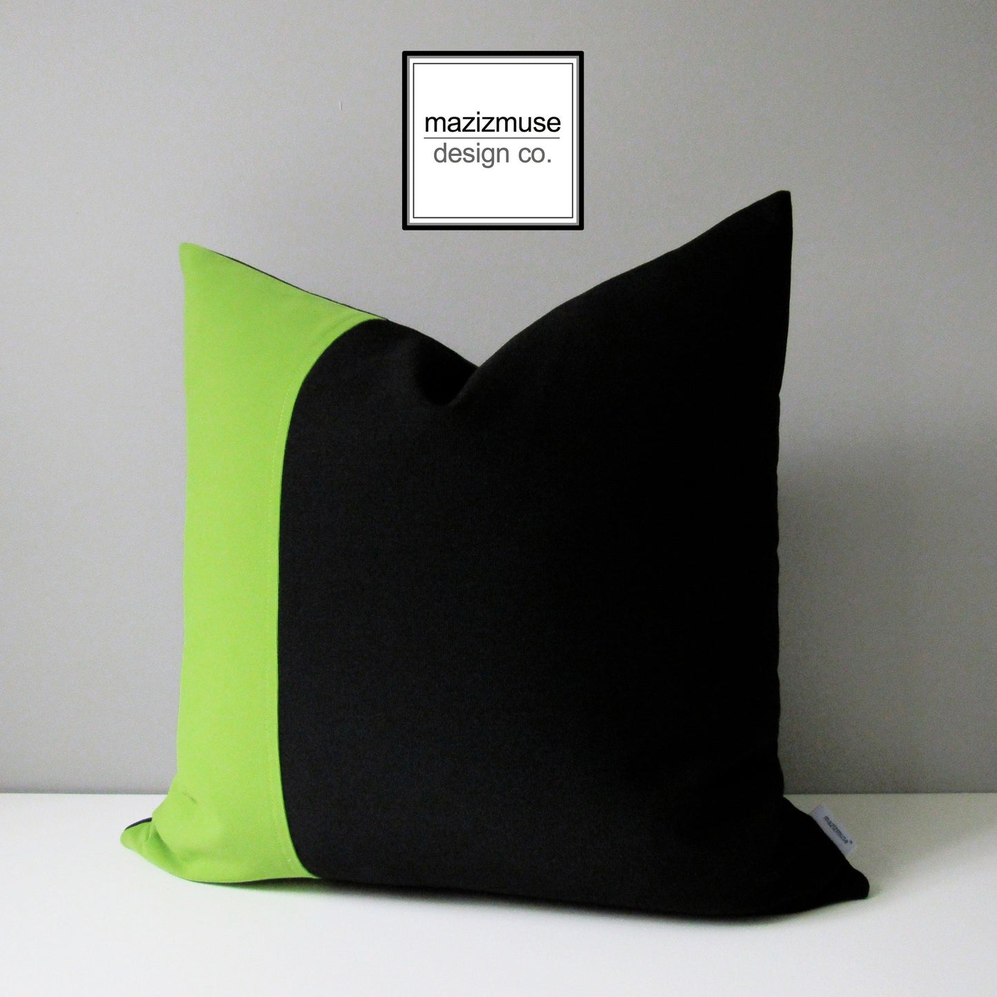 black and lime green outdoor sunbrella pillow
