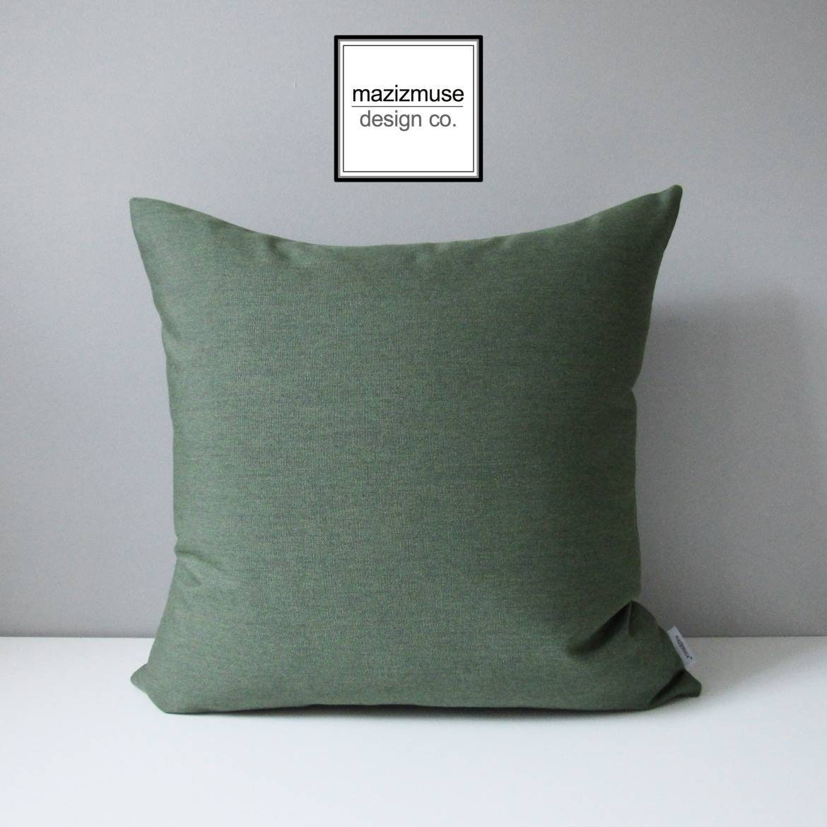 fern green sunbrella outdoor pillow cushion for patio seating