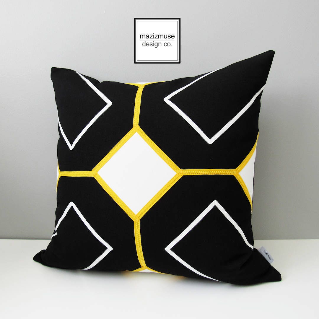 black-white-outdoor-sunbrella-cushion-with-yellow-trim