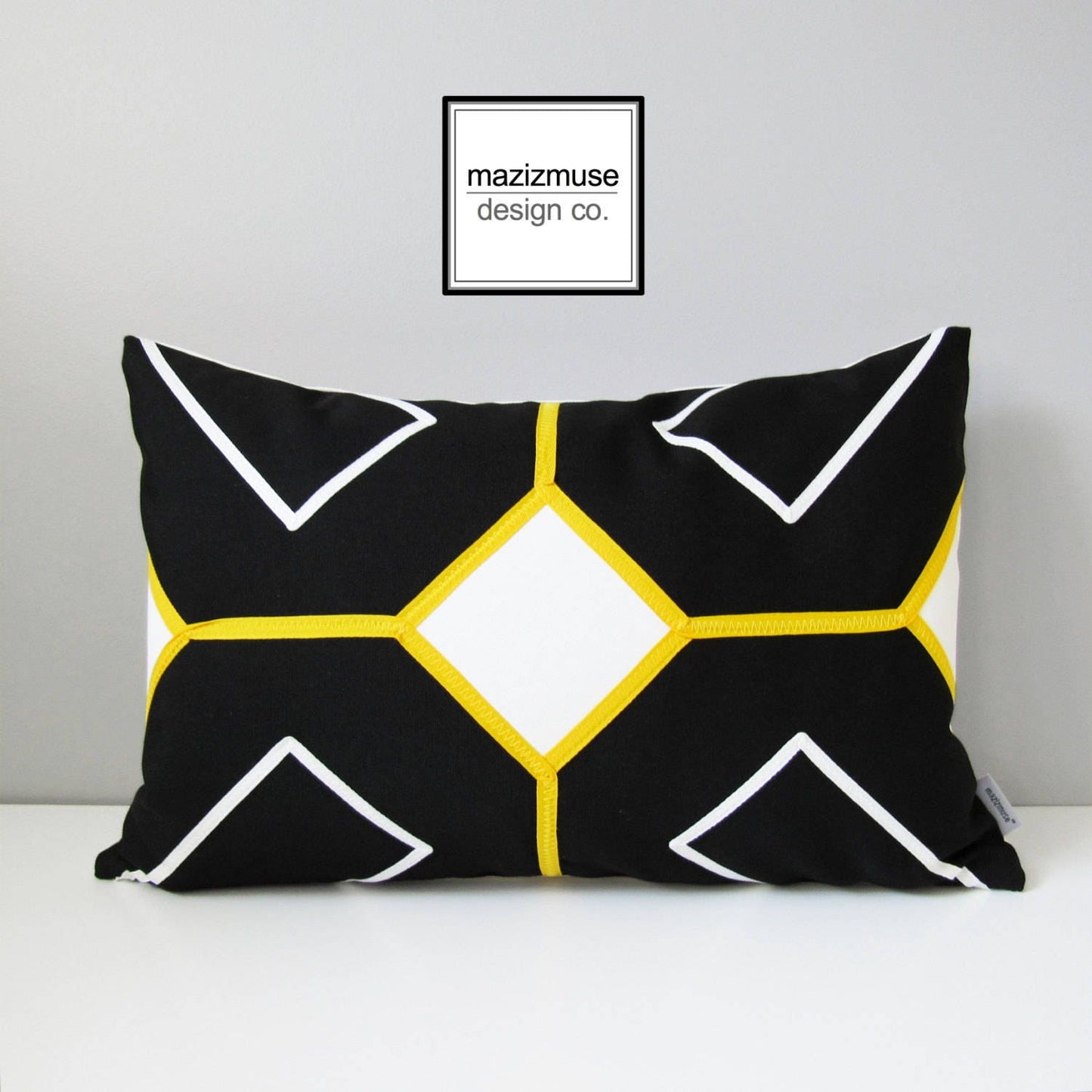 Black & White Sunbrella Cushion With Yellow Geometric Trim
