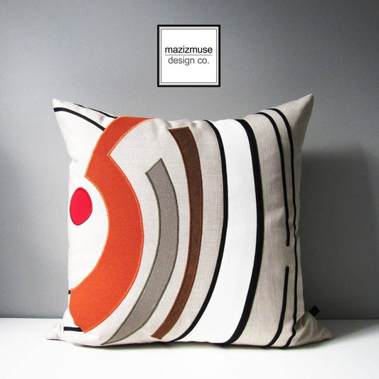 abstract mid century styled outdoor pillow in flax red orange and brown sunbrella fabric 