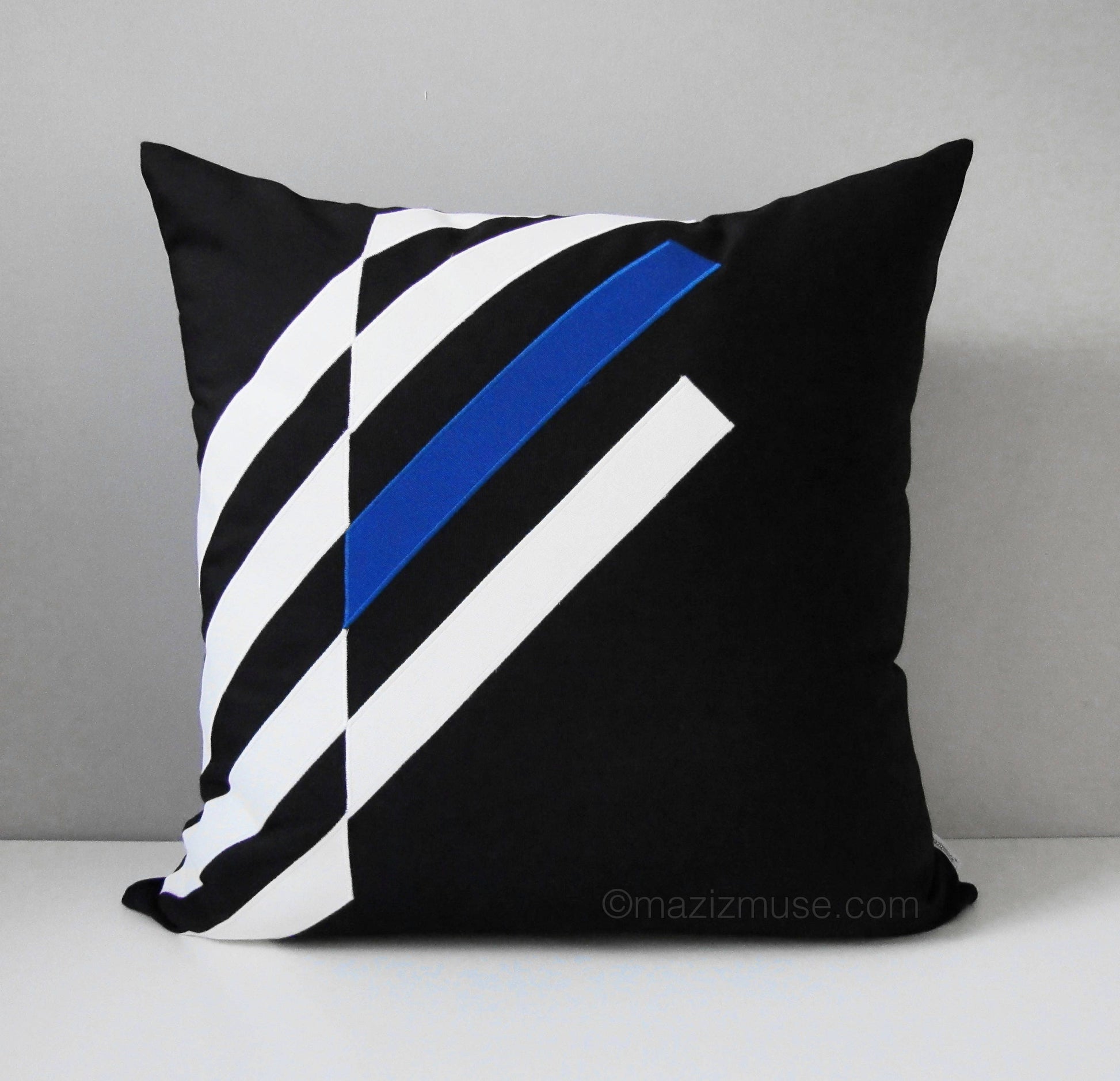 black white and cobalt blue outdoor sunbrella pillow