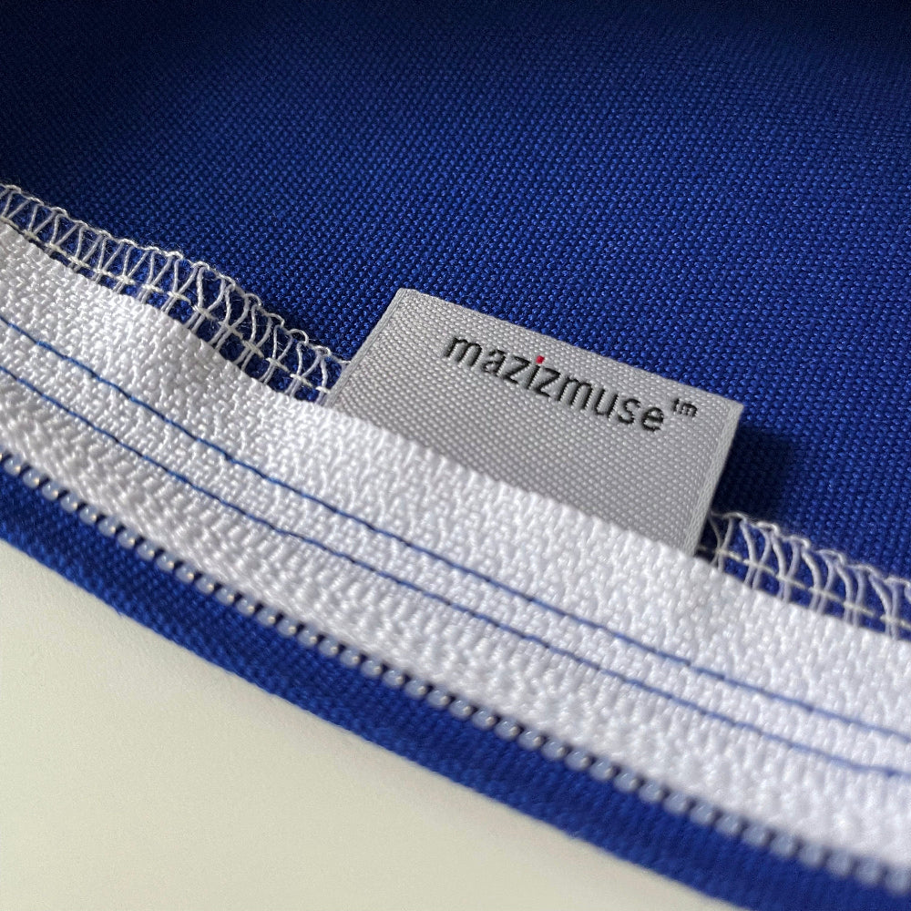 Royal Blue & Turquoise Mod Sunbrella Pillow Cover showing label and stitching