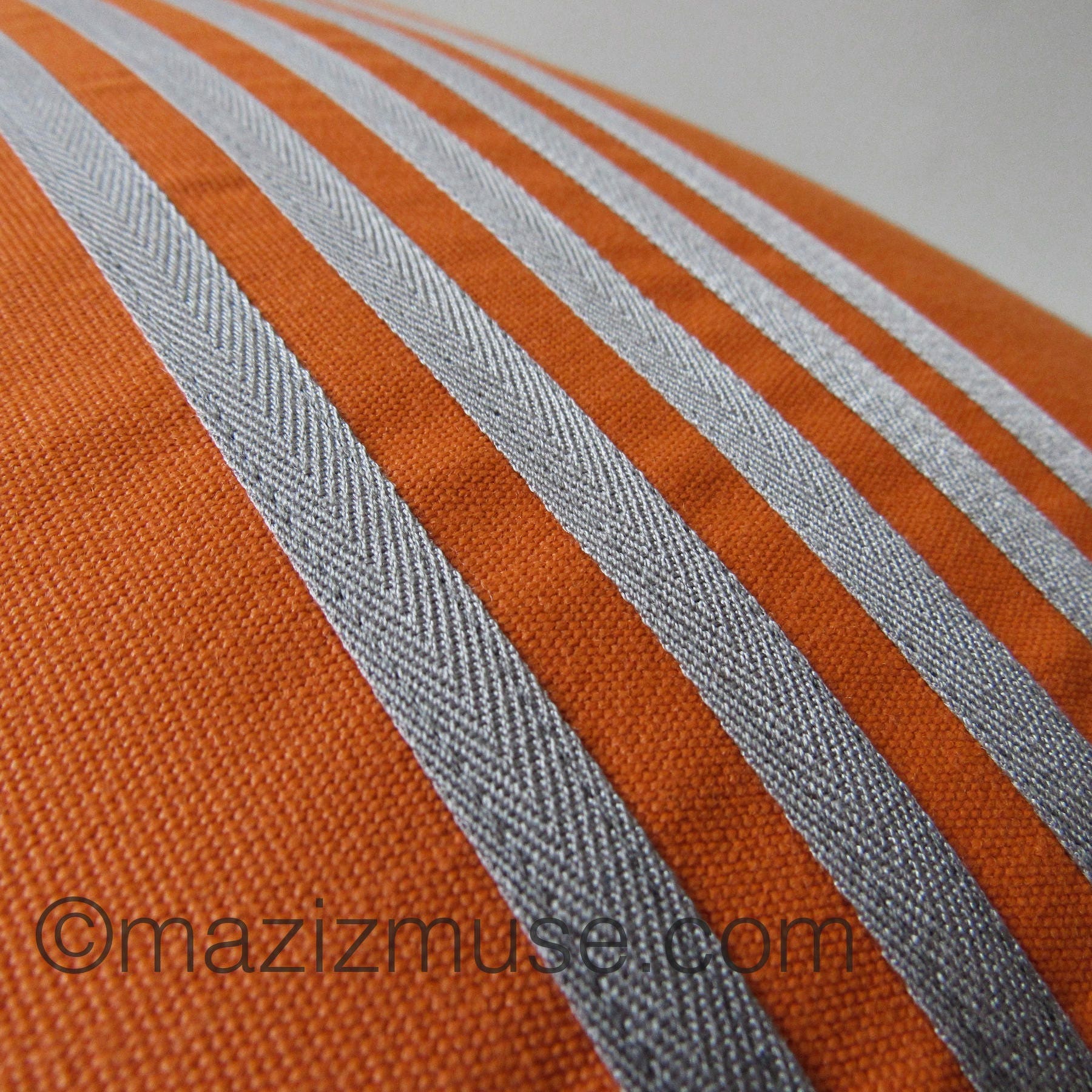 orange grey stitching of trim and canvas texture of sunbrella fabric